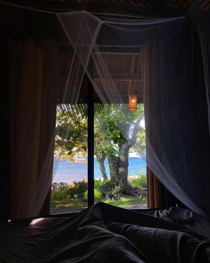 La Tortue Diving Resort Dauin Bagian luar foto